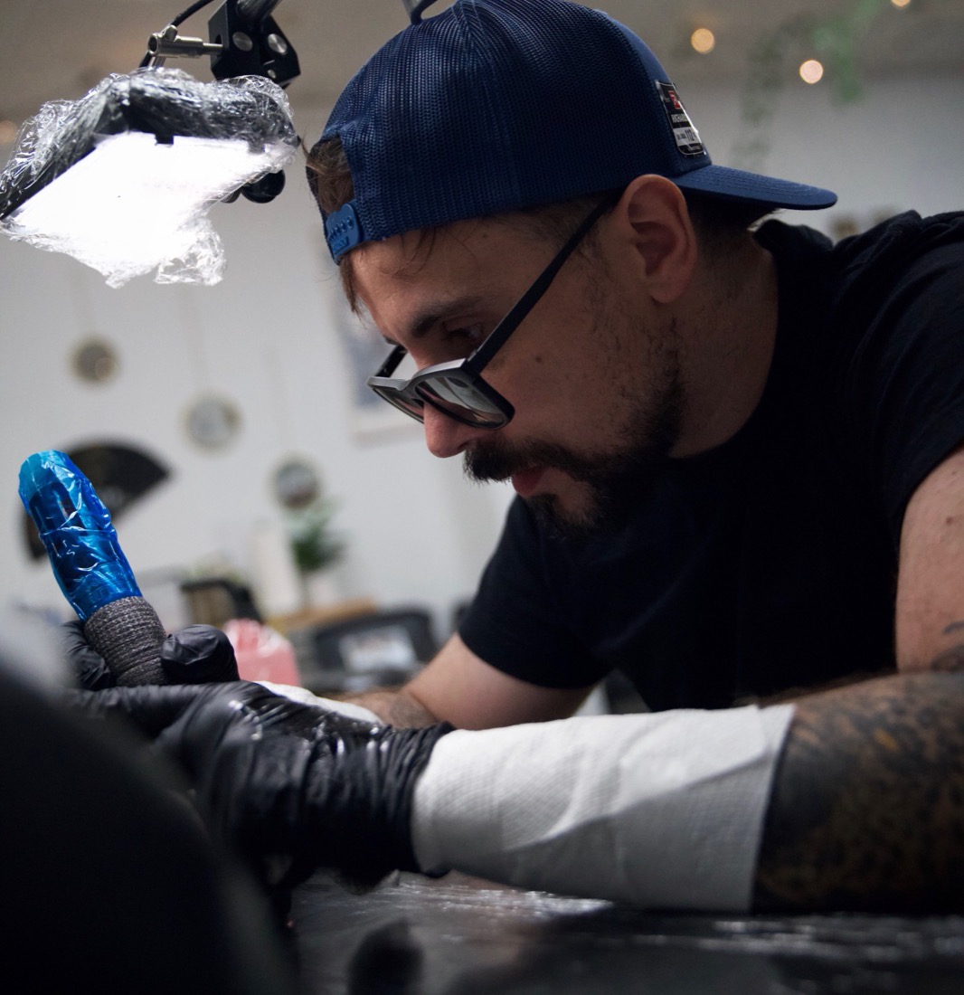 Tony (Argento Tattoos) tattooing a client at Rabbit's Paw Tattoo